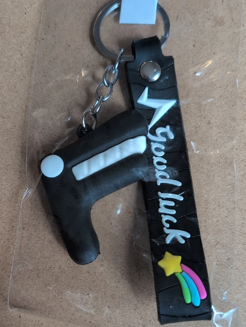 Black Roller Skate Keychain with Rainbow Star Accent